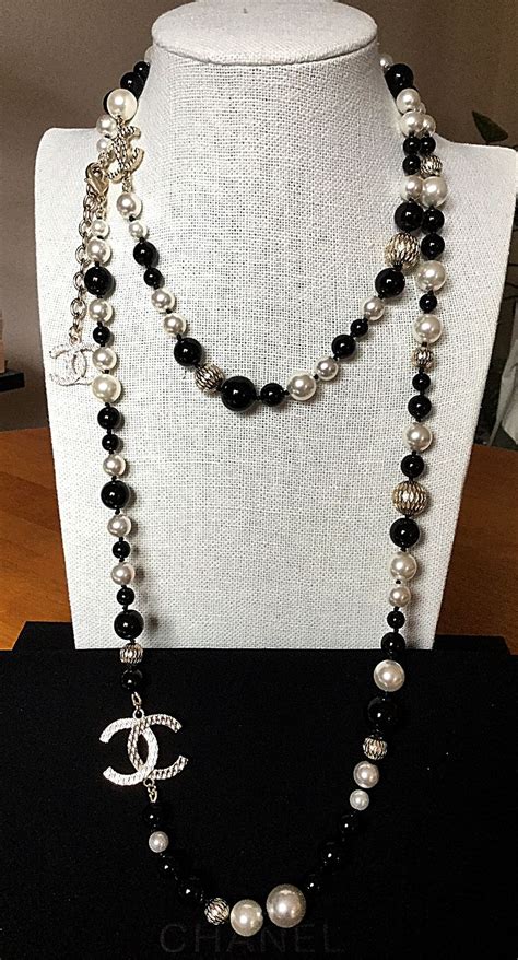 chanel black and white necklace.